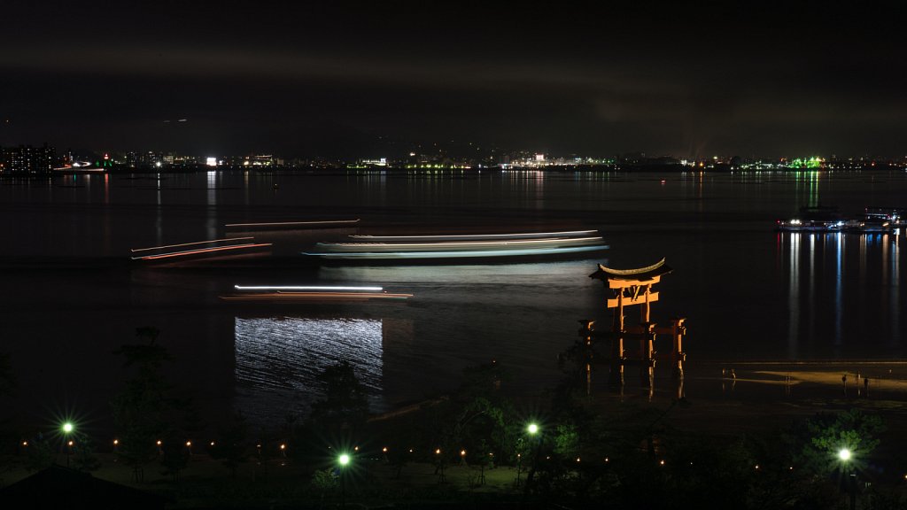 Long exposure of ferries and party boats